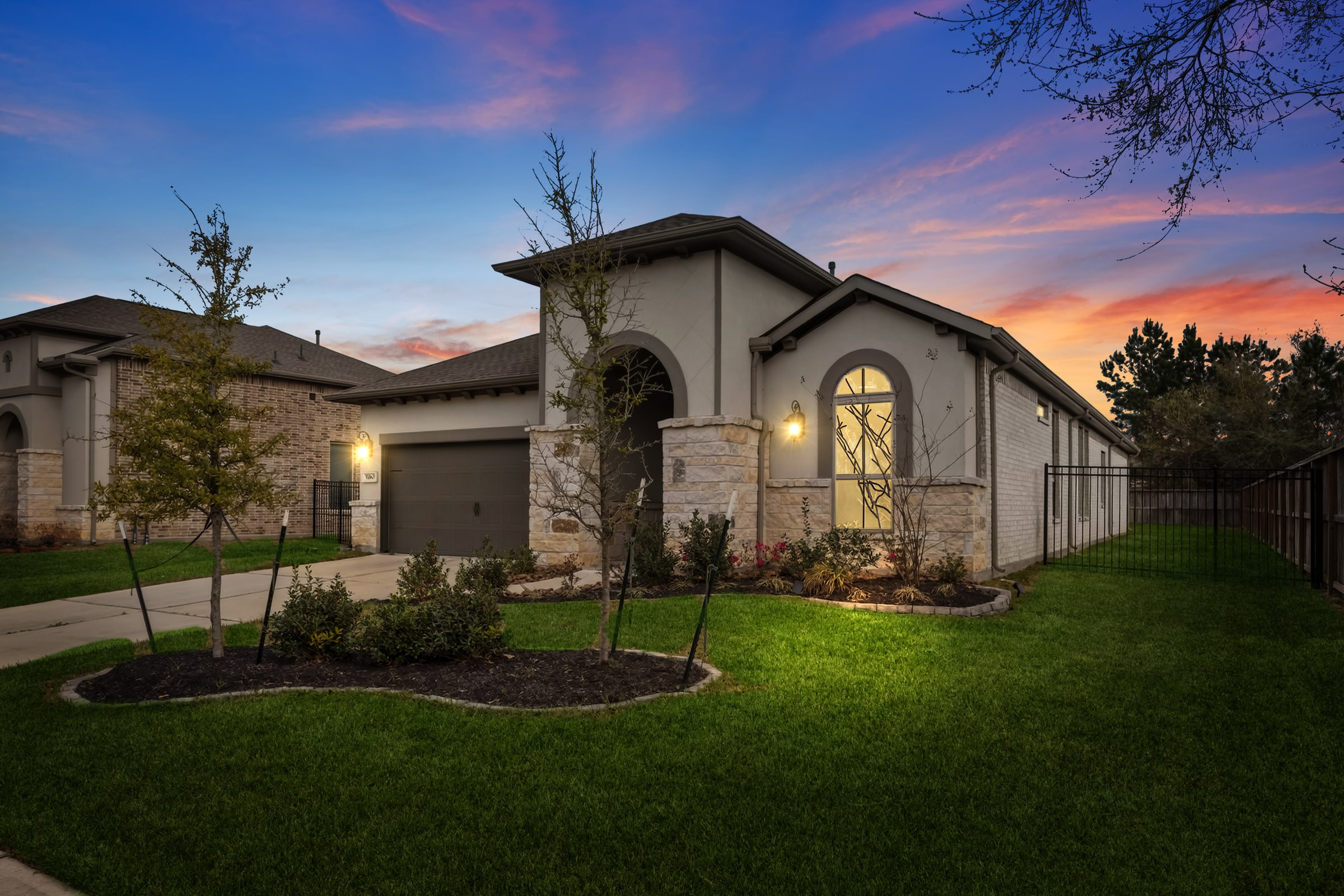 Twilight exterior of a modern Houston home